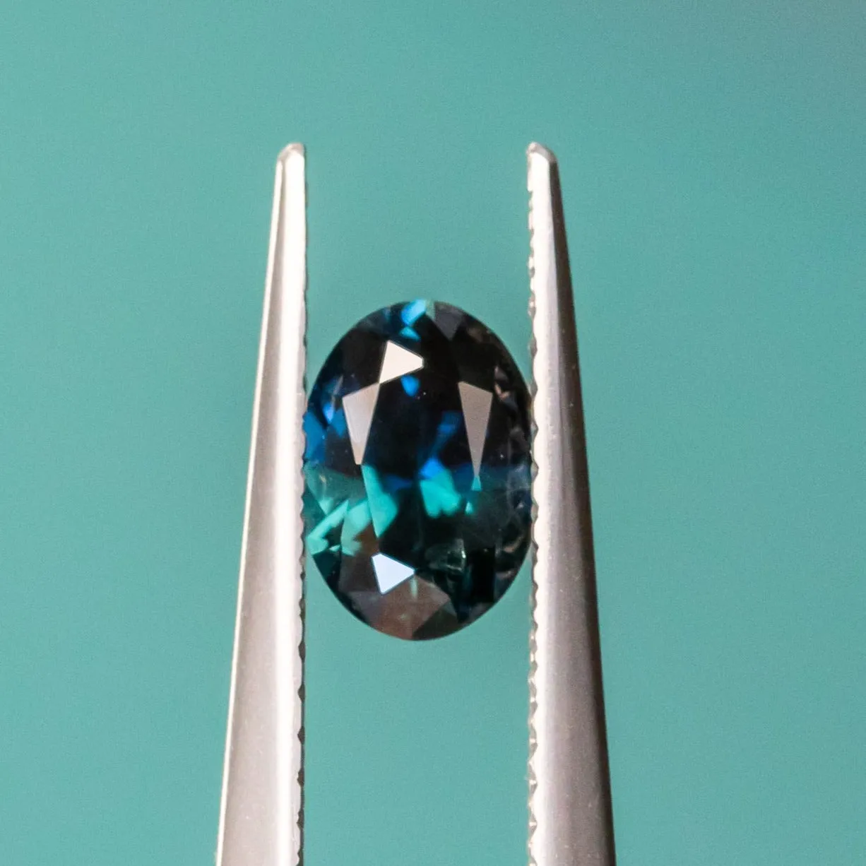 0.87CT OVAL NIGERIAN SAPPHIRE, DEEP OCEAN BLUE, 6.93X4.98X4.98MM, UNTREATED