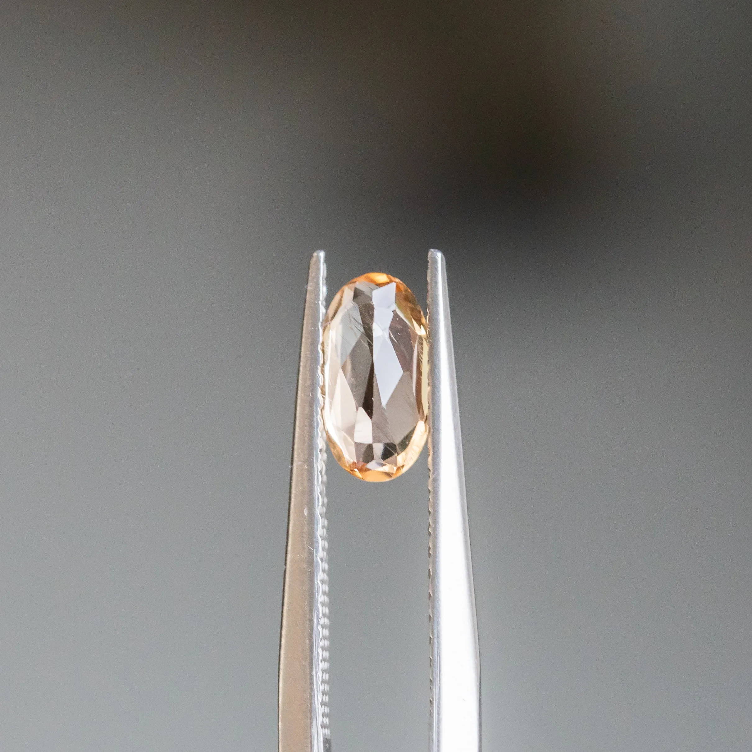 0.89CT OVAL MONTANA SAPPHIRE, PEACH, 8X4.5X2.79MM