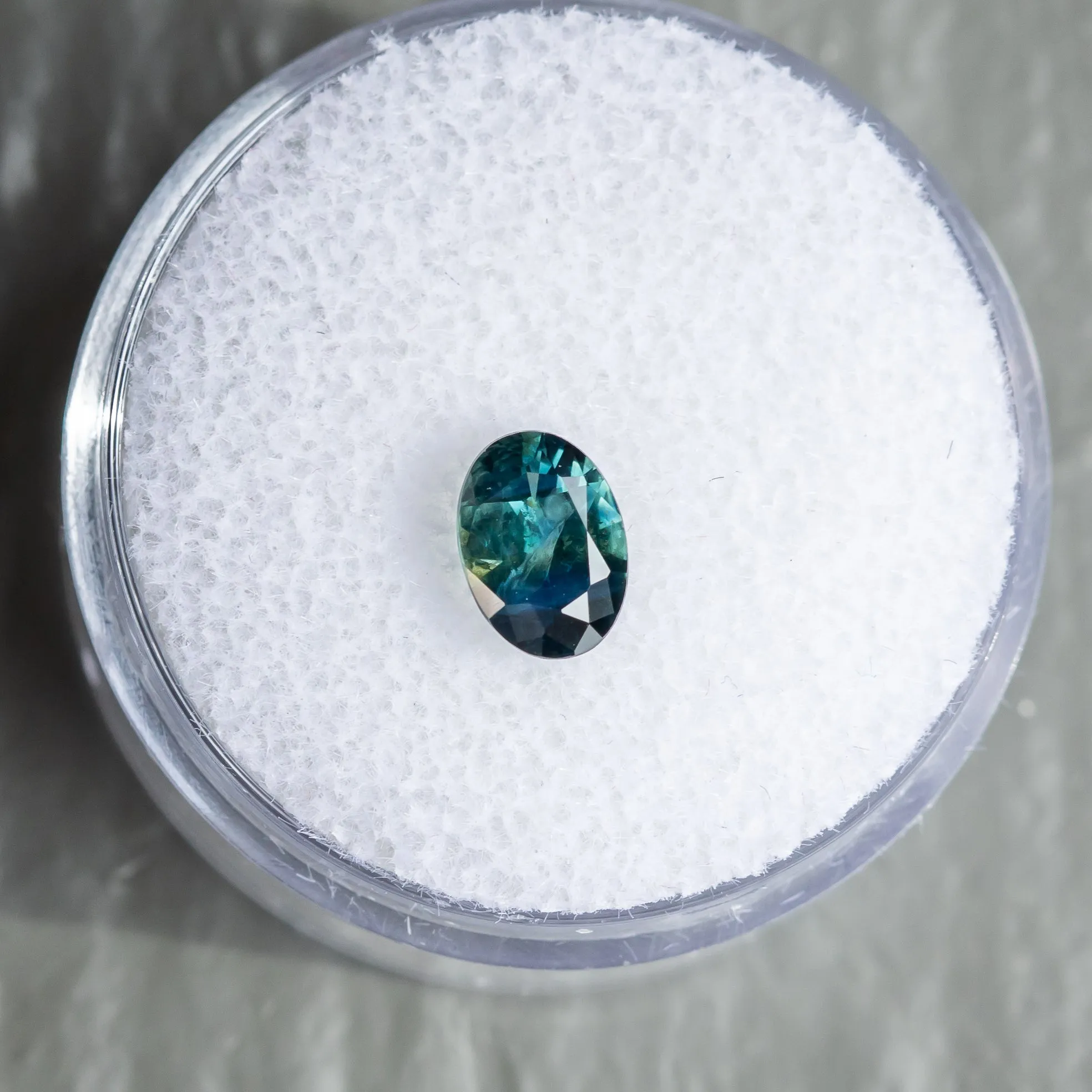 0.92CT OVAL NIGERIAN SAPPHIRE, TEAL PARTI GREEN, 7.01X5.01X3.27MM, UNTREATED