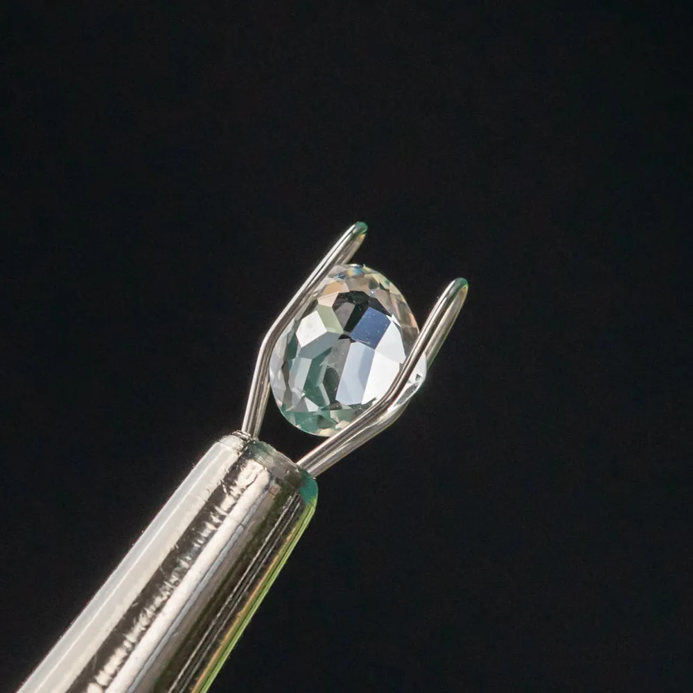 0.94CT MODIFIED PEAR TRILLION MADAGASCAR SAPPHIRE, WHITE, 5.6MM X 6.3MM