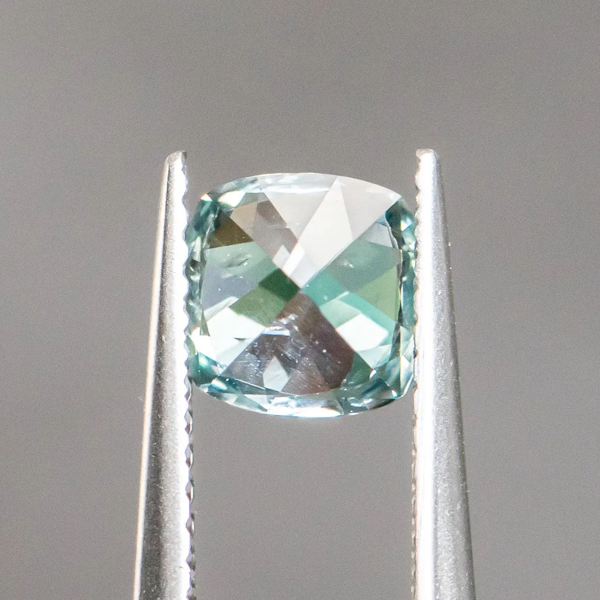 1.34CT CUSHION CUT MONTANA SAPPHIRE, SKY BLUE TEAL, 6.05X6.02X4.54MM, UNHEATED