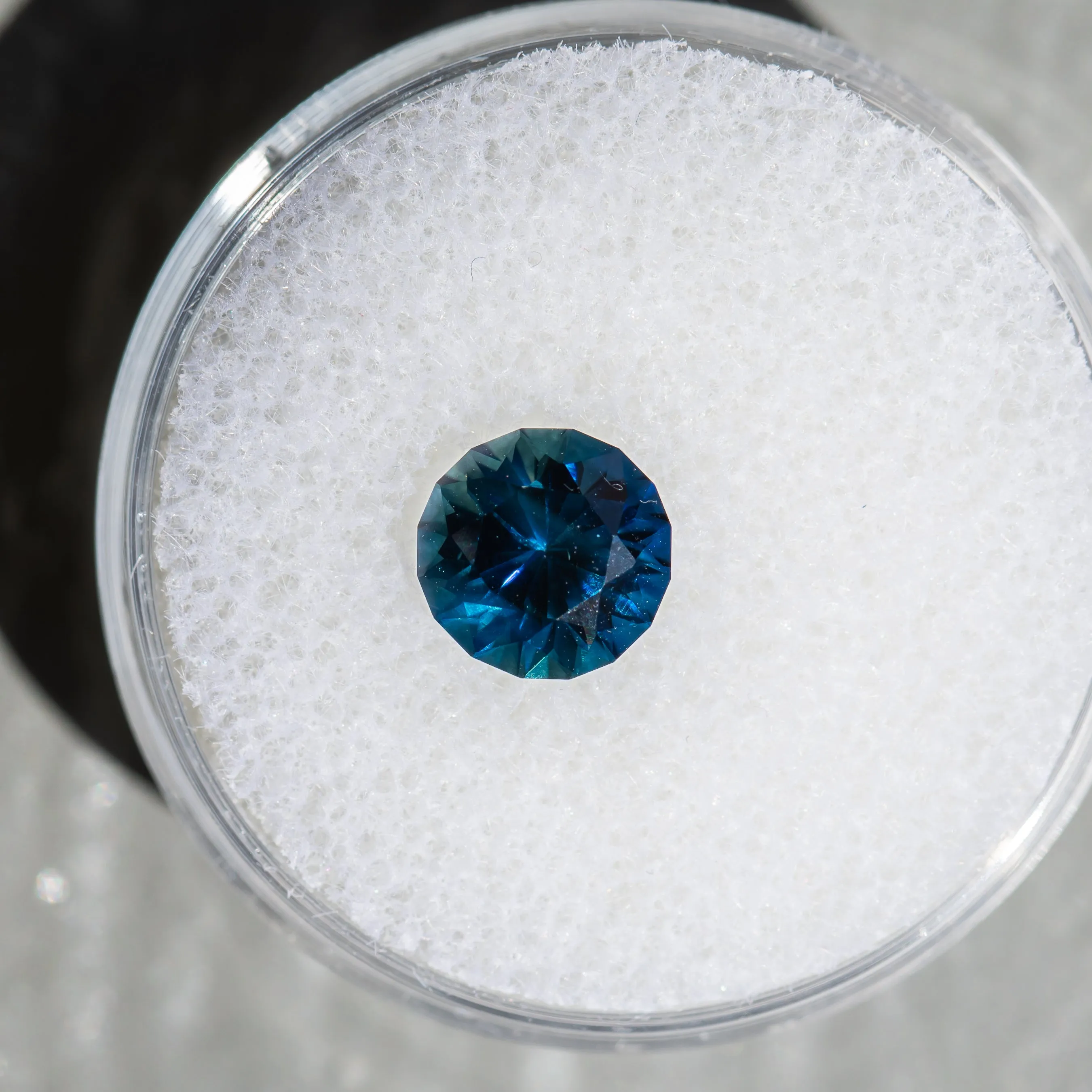 1.78CT ROUND GOMBE SAPPHIRE, DEEP BLUE TEAL, 7.10X4.86MM, UNTREATED.