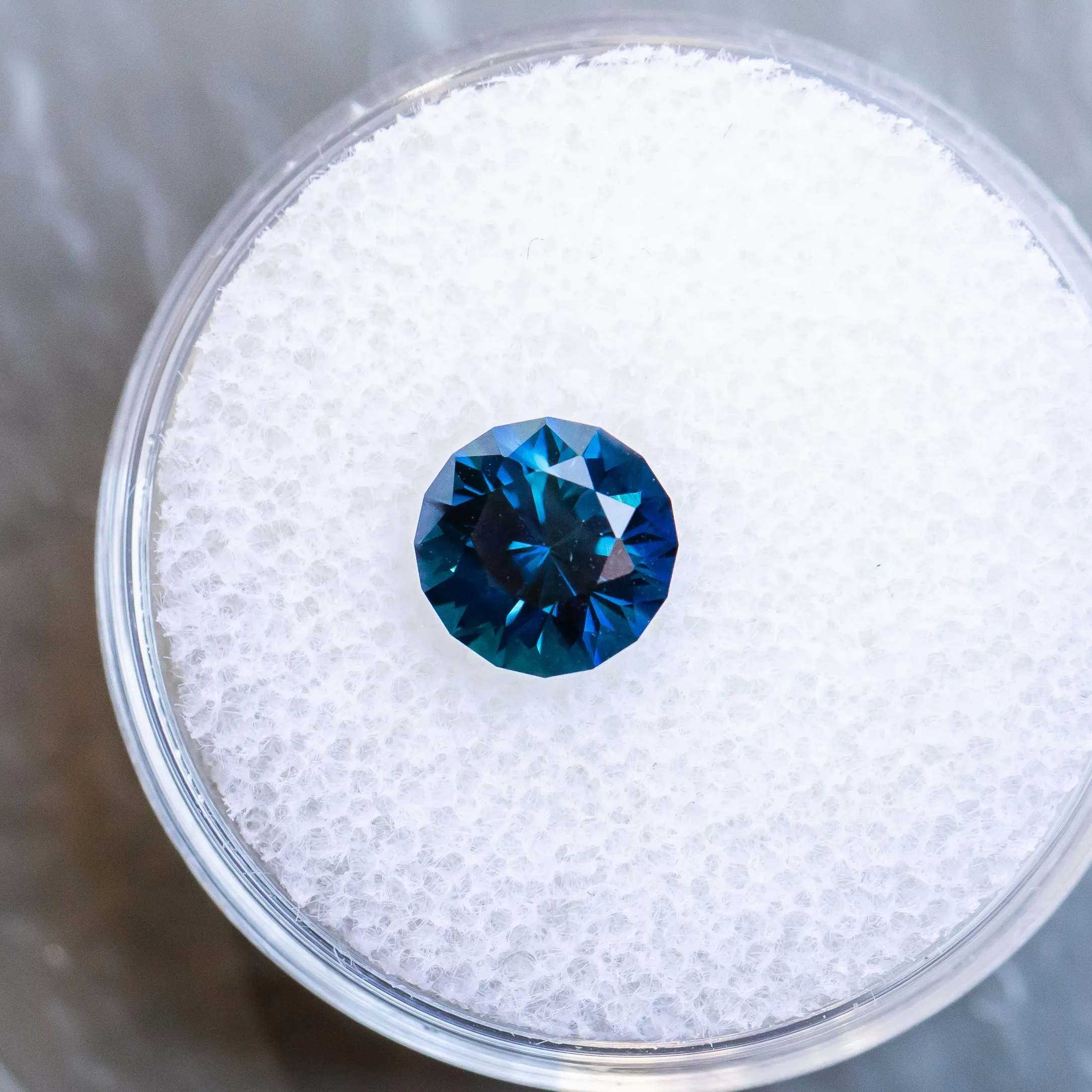 1.78CT ROUND GOMBE SAPPHIRE, DEEP BLUE TEAL, 7.10X4.86MM, UNTREATED.