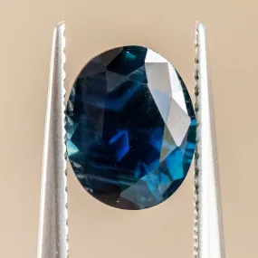 2.38CT OVAL NIGERIAN SAPPHIRE, DEEP OCEAN BLUE WITH GROWTH LINES, 8.59X6.9X4.82MM, UNTREATED